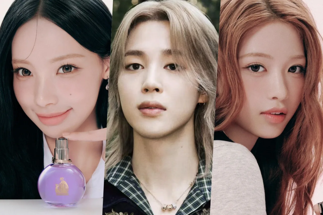 Woni, idol da RESCENE, posa sorrindo em traje colorido, com o logotipo da RESCENE ao fundo