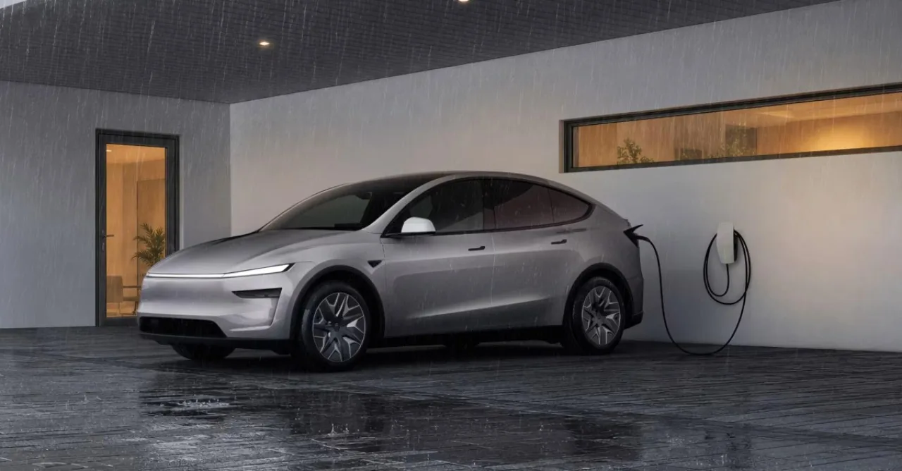 Model 3 e Model Y estacionados ao lado de um Powerwall 3, conectados a uma casa que recebe energia