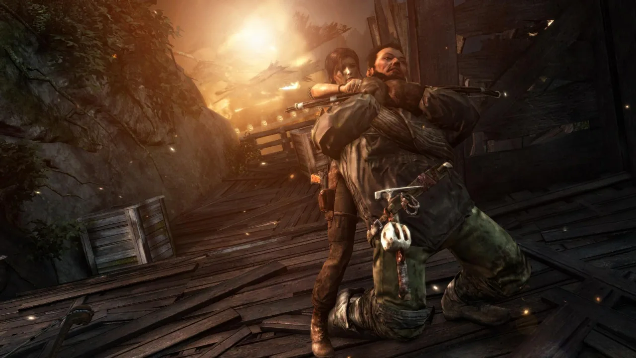 Jogador segurando o Nintendo Switch 2 com a caixa física de Tomb Raider: Definitive Edition ao lado