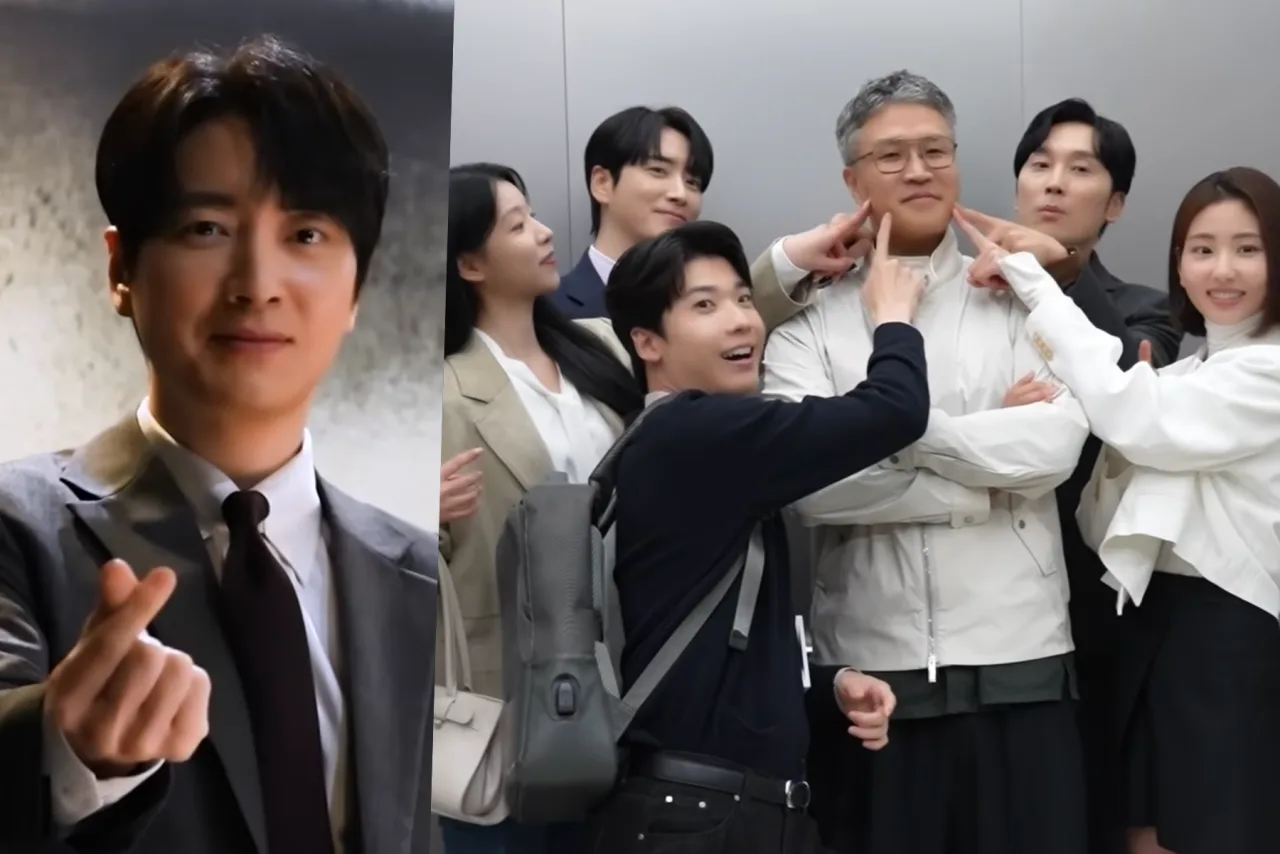 Lee Jun Hyuk e Seo Hyun Woo conversam no set de The Ordinary Jackpot, cercados por câmeras e o logo da Viki