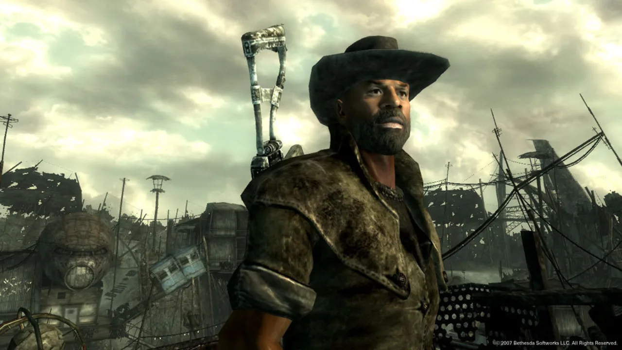 Jogador sentado, segurando o controle, ao lado de halteres e garrafa de água, com pôster de Fallout ao fundo
