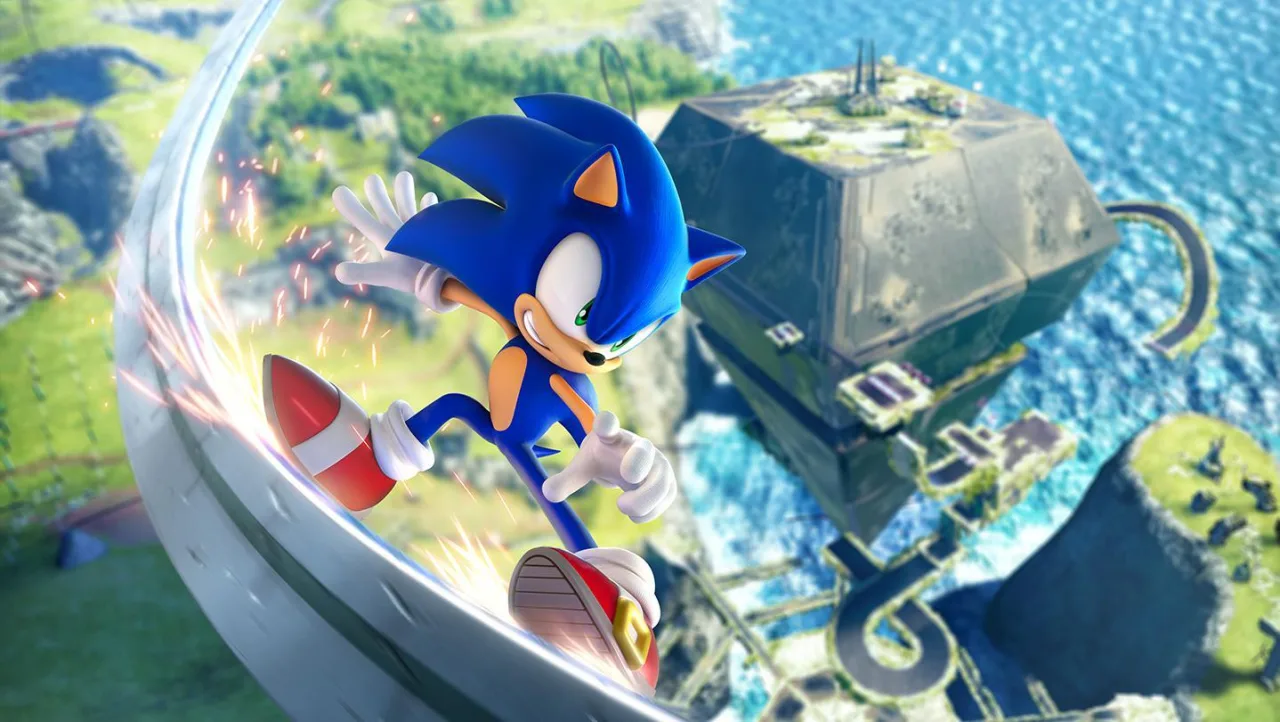 Controle de videogame, tênis de corrida e um Sonic estilizado sobre uma mesa organizada com garrafa de água e frutas