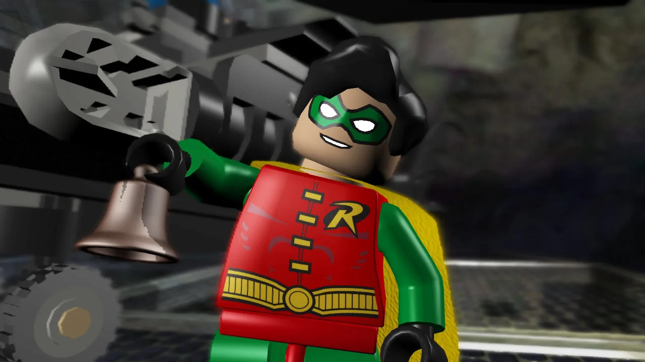 Um jogador focado segurando um controle de videogame ao lado de uma mesa com peças de LEGO e uma garrafa de água