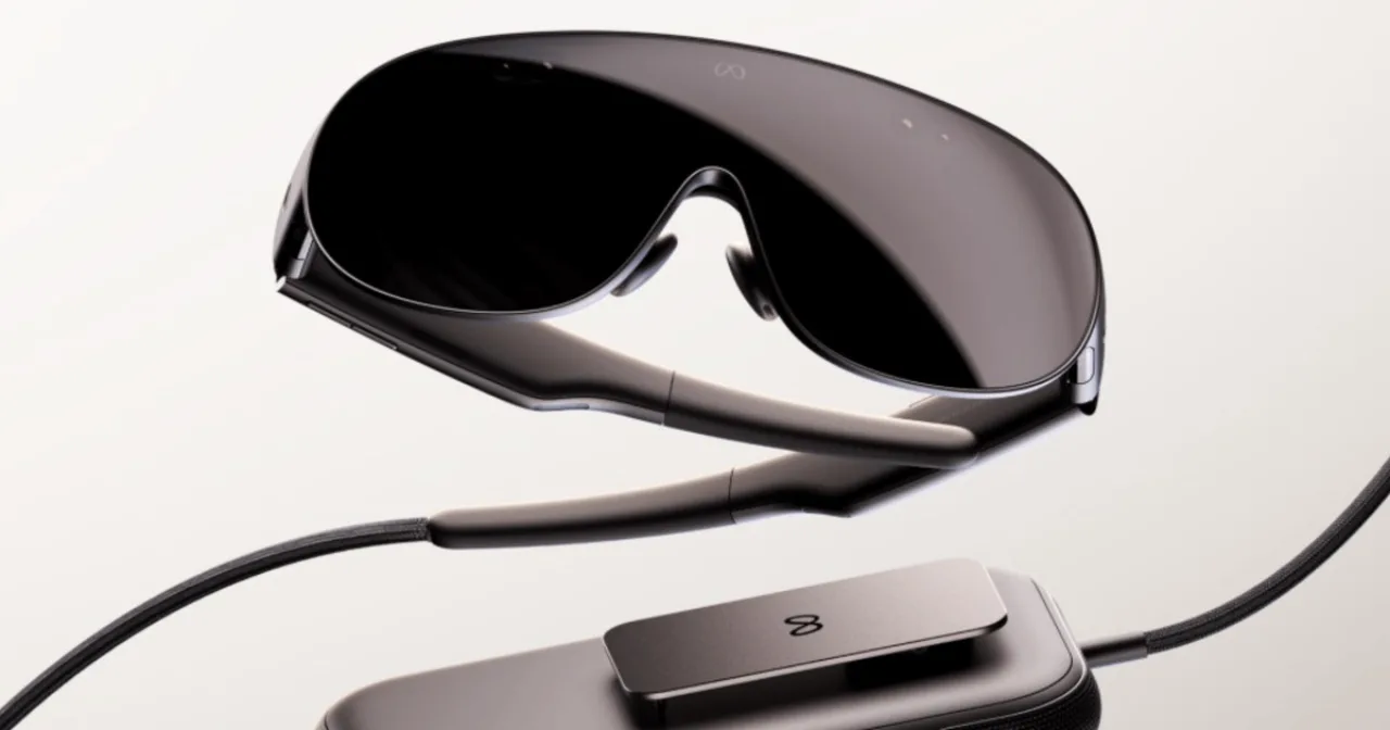Meta VR Glasses prateados sobre fundo escuro, com logo da Meta ao lado e destaque para seu design leve de 100 g