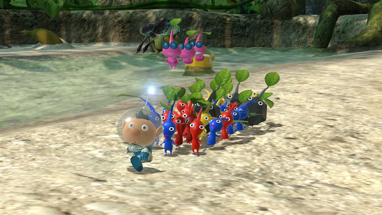 Jovem faz agachamento segurando o Switch, ao lado de garrafa d'água, tapete de yoga e tigela de frutas em forma de Pikmin