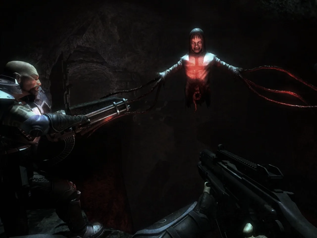 Jogador levanta halteres enquanto segura controle, com pôster de Hellraiser ao fundo