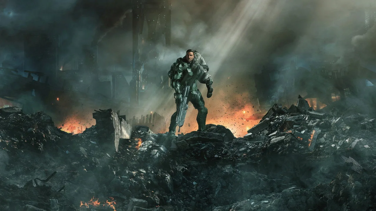 Jovem em roupa esportiva faz agachamento enquanto segura controle de videogame e tem a capa de Halo ao fundo
