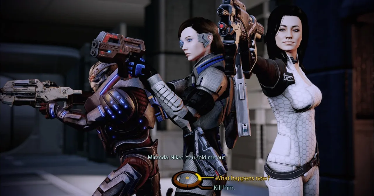 Logotipos da EA e da BioWare sobre uma porta de estúdio com placa “Closed” e mesas vazias ao fundo