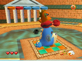 Jovem sentado no sofá, jogando Glover no Switch, com garrafa de água e barra de proteína ao lado